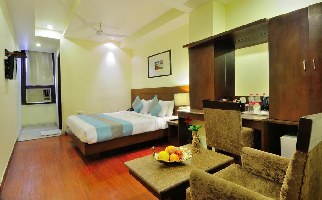 Hotel Suncity Делі Номер фото